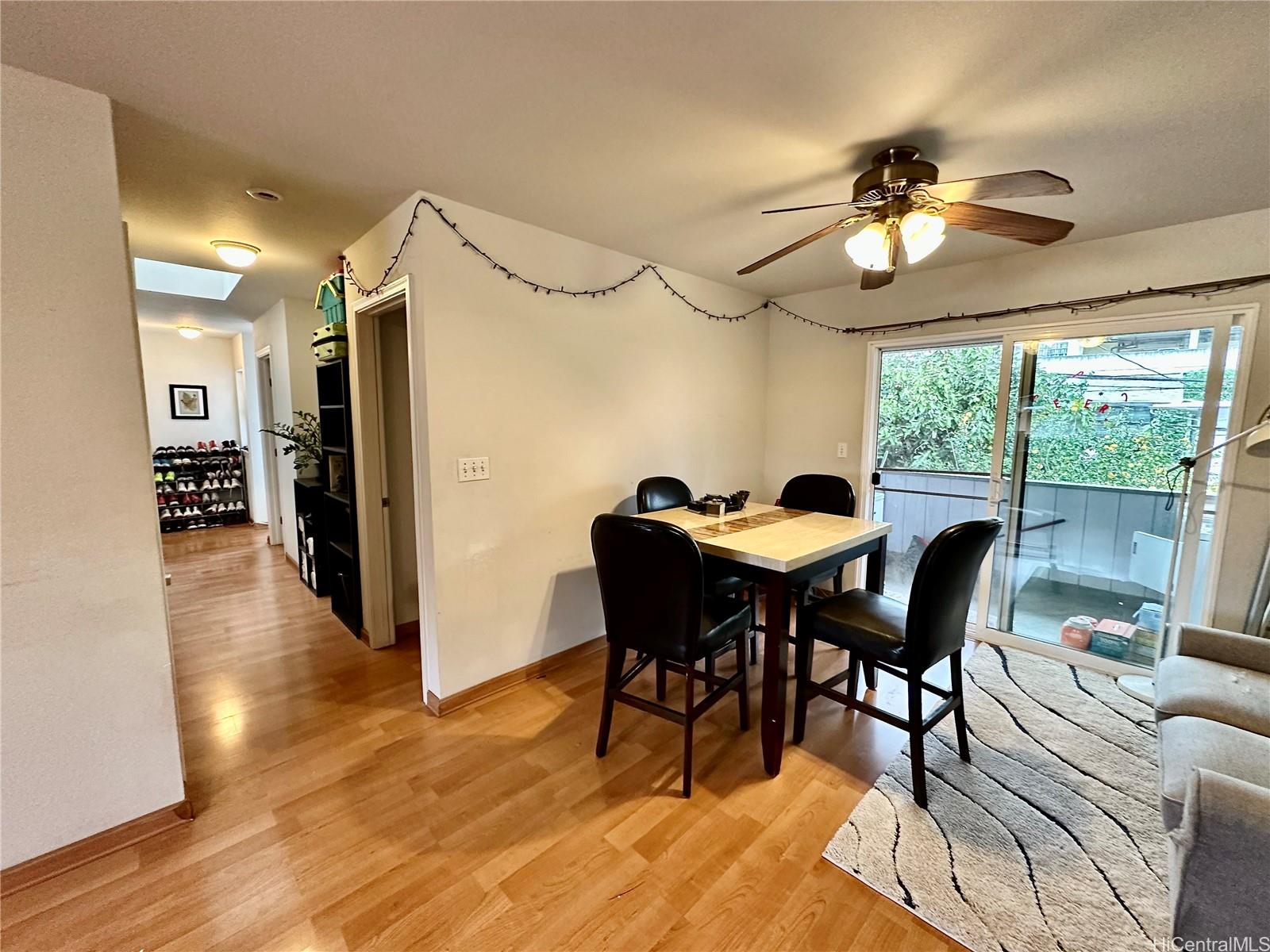 2205 Fern Street Honolulu, HI 96826 - Photo 4 of 13 a view of a dining room with furniture window and wooden floor