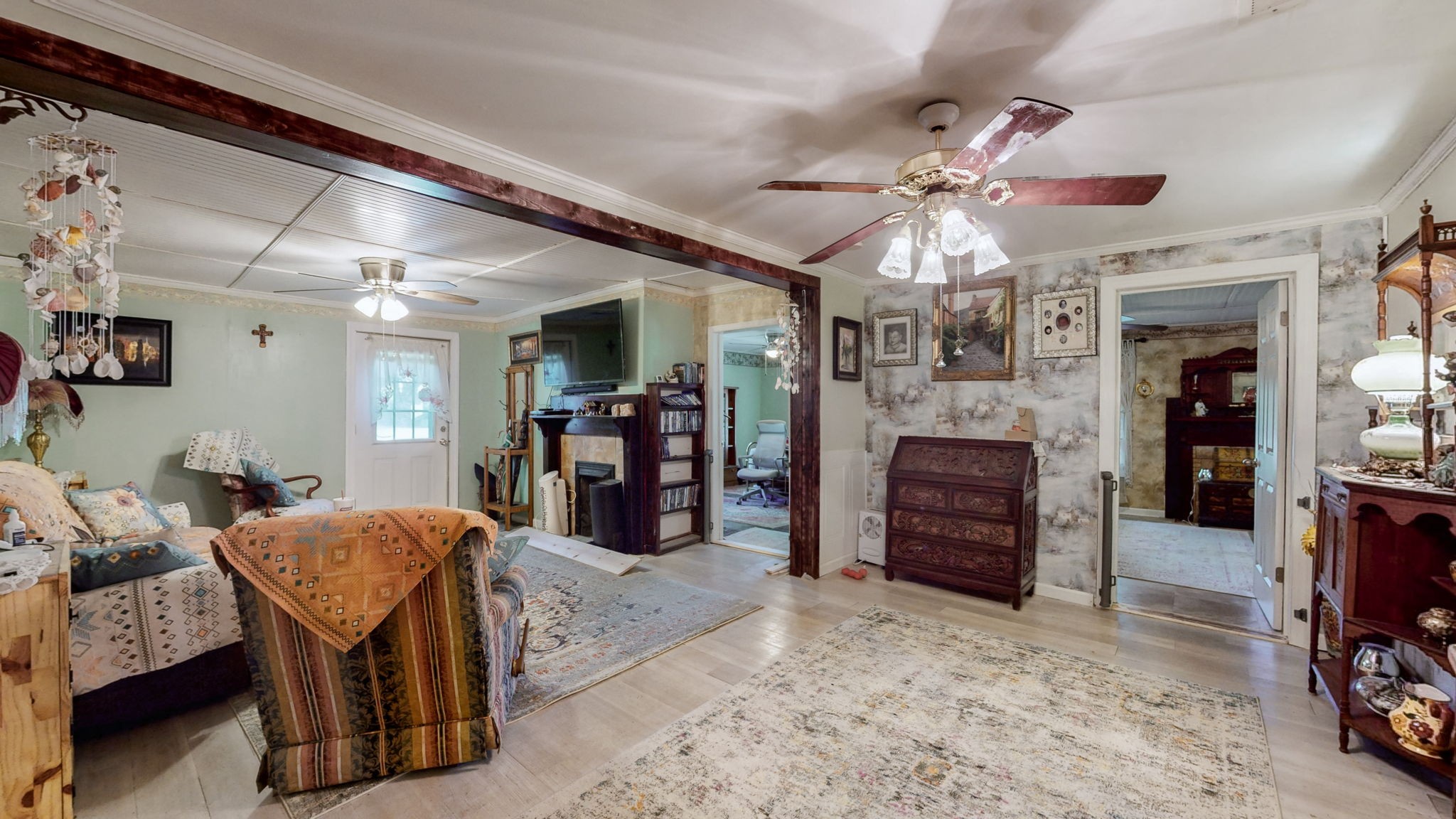407 Villa Street Murfreesboro, TN 37129 - Photo 11 of 33 a view of a livingroom with furniture and a ceiling fan