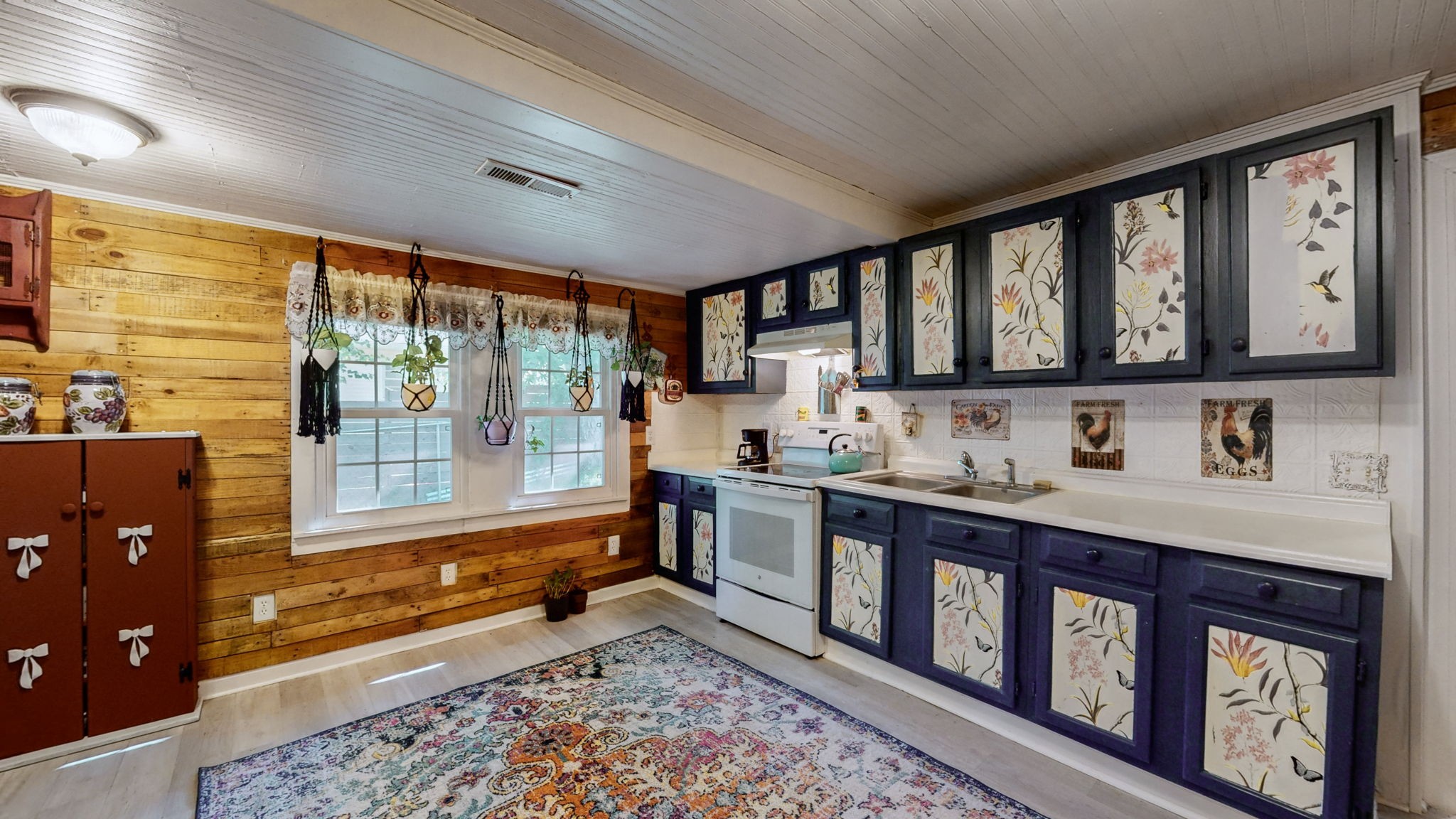 407 Villa Street Murfreesboro, TN 37129 - Photo 12 of 33 a bathroom with a sink a vanity and a large mirror