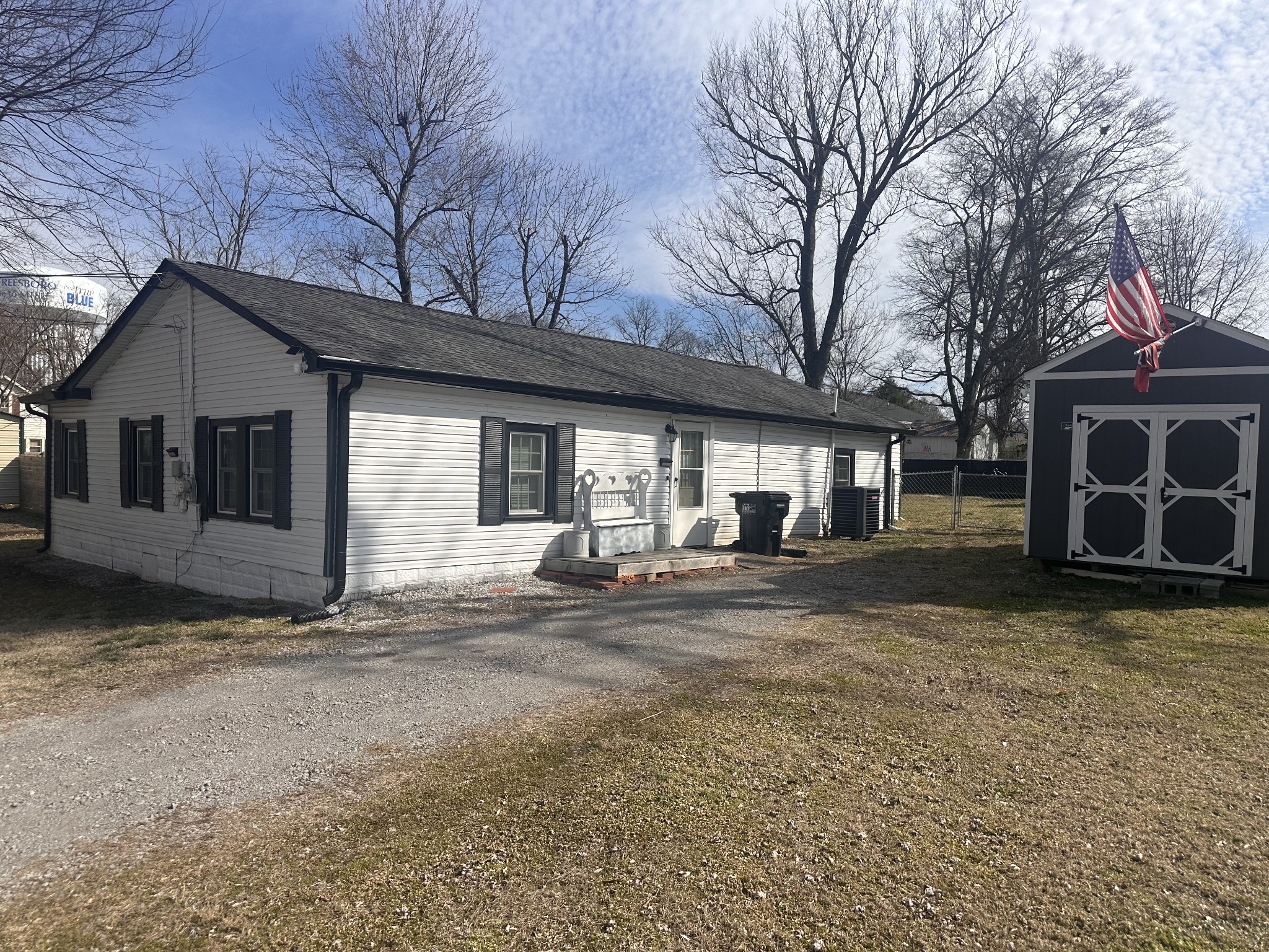 407 Villa Street Murfreesboro, TN 37129 - Photo 32 of 33 a view of a house with a yard and garage