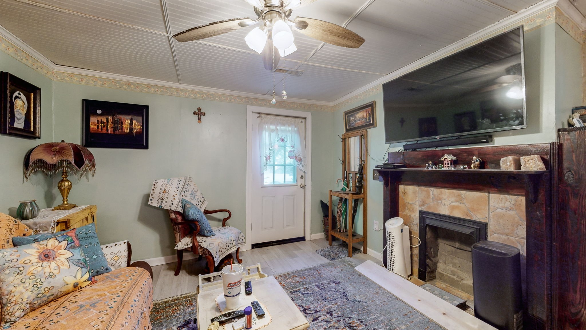 407 Villa Street Murfreesboro, TN 37129 - Photo 7 of 33 a living room with furniture and a flat screen tv