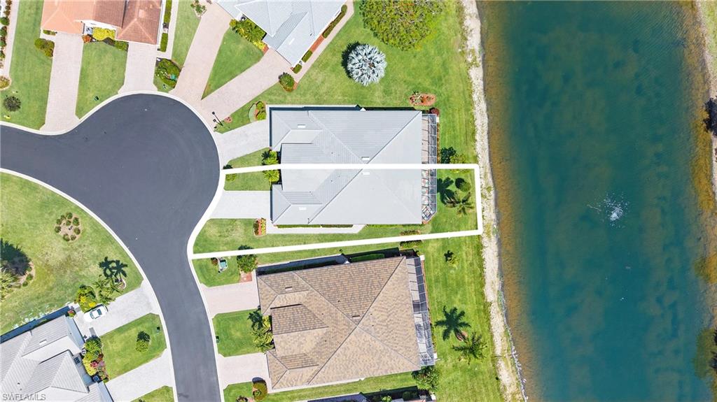 7737 Haverhill Court Naples, FL 34104 - Photo 37 of 37 Aerial perspective highlighting a property with a water feature frontage and cul-de-sac access