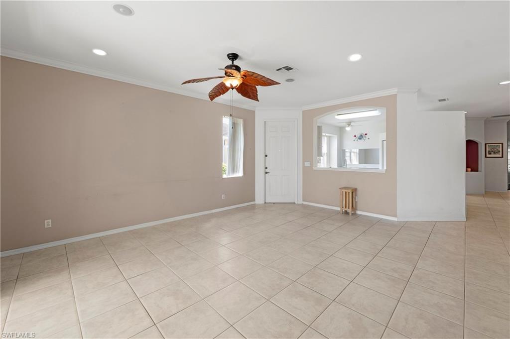 7737 Haverhill Court Naples, FL 34104 - Photo 8 of 37 Spacious living area featuring neutral tile flooring, recessed lighting, and a ceiling fan