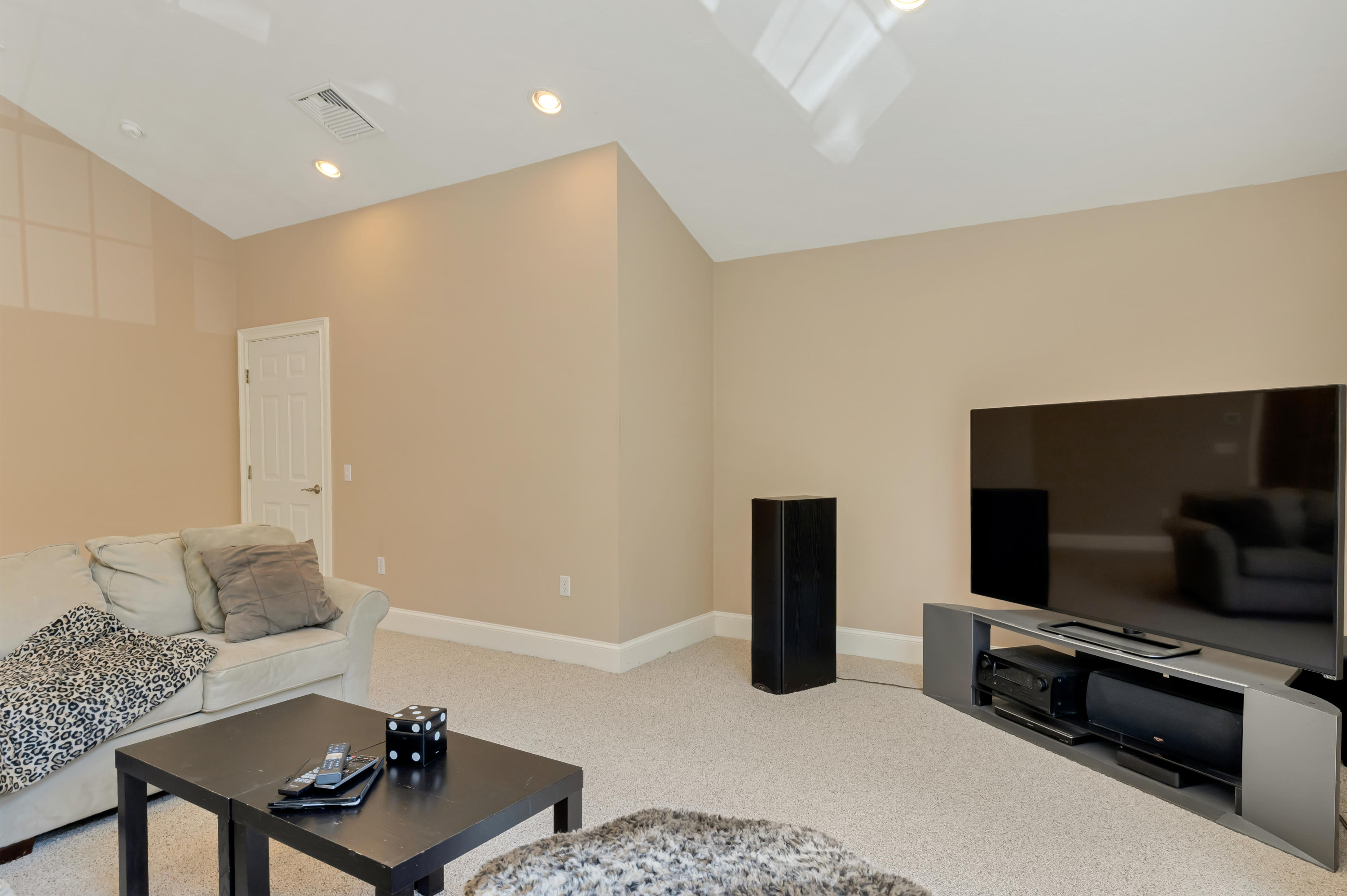 23 Harlow Road Sandwich, MA 02563 - Photo 20 of 44 a living room with furniture and a flat screen tv