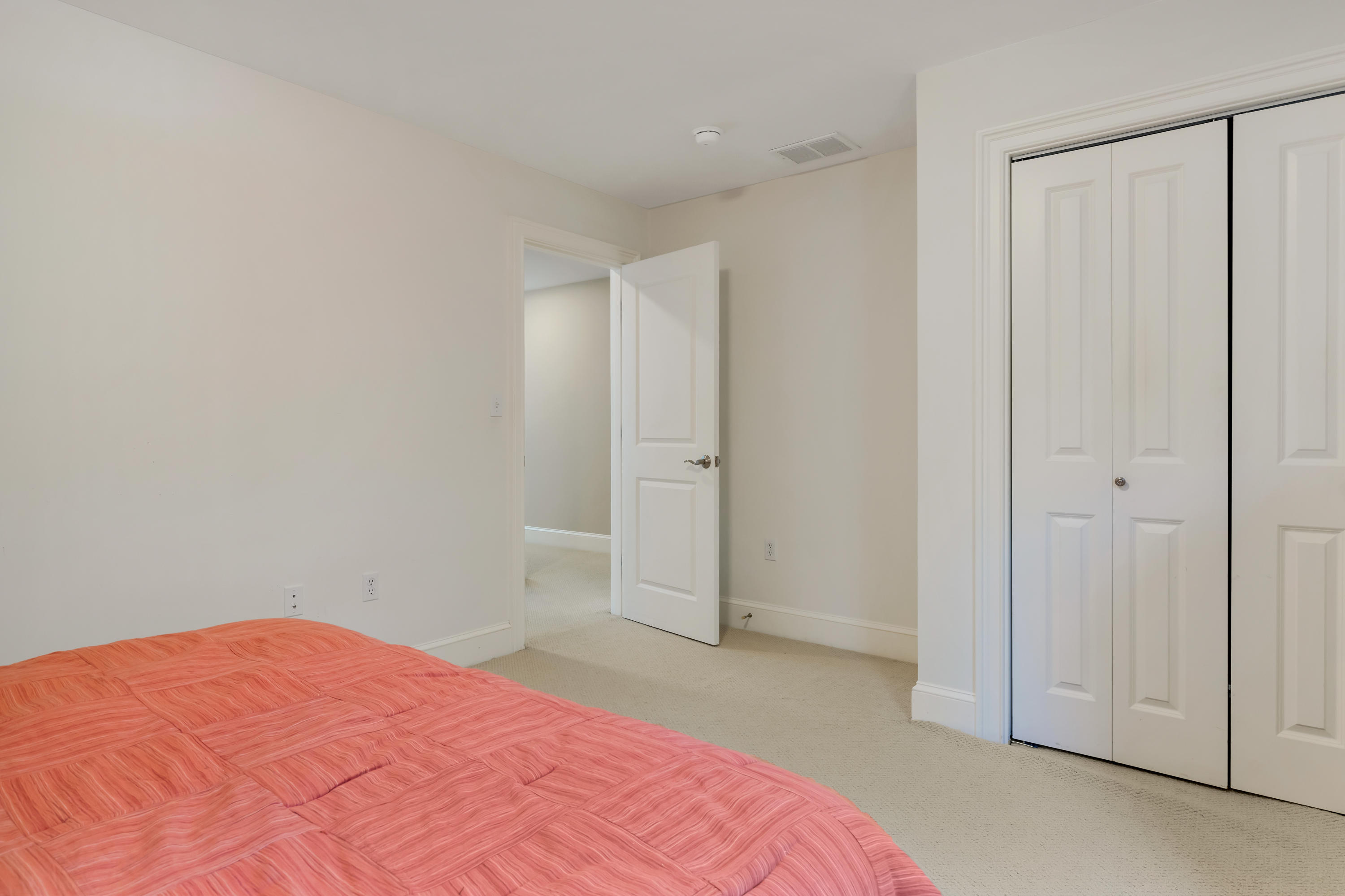 23 Harlow Road Sandwich, MA 02563 - Photo 23 of 44 a view of a room with a bed and cabinet