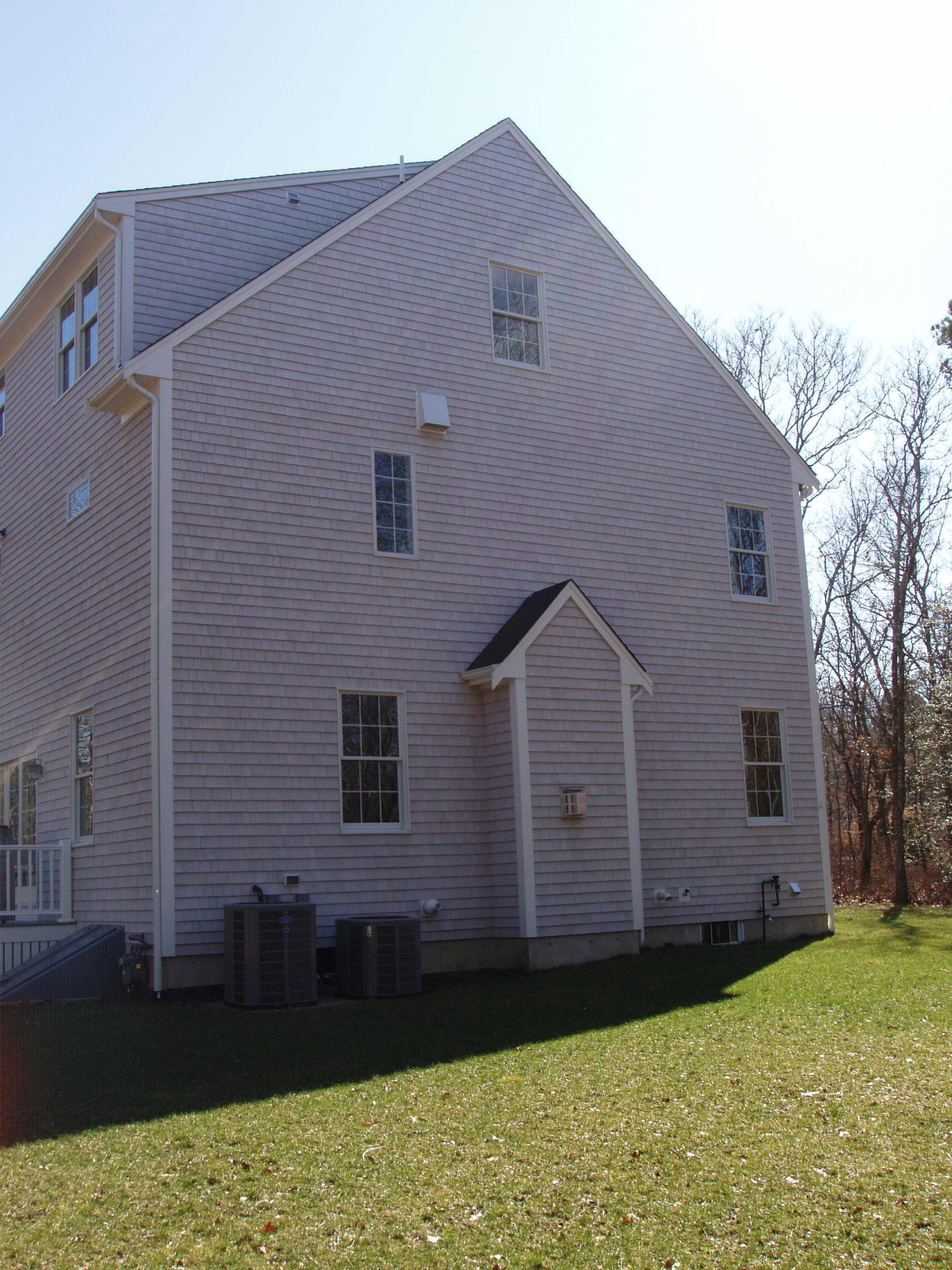 23 Harlow Road Sandwich, MA 02563 - Photo 4 of 44 a front view of a house with garden