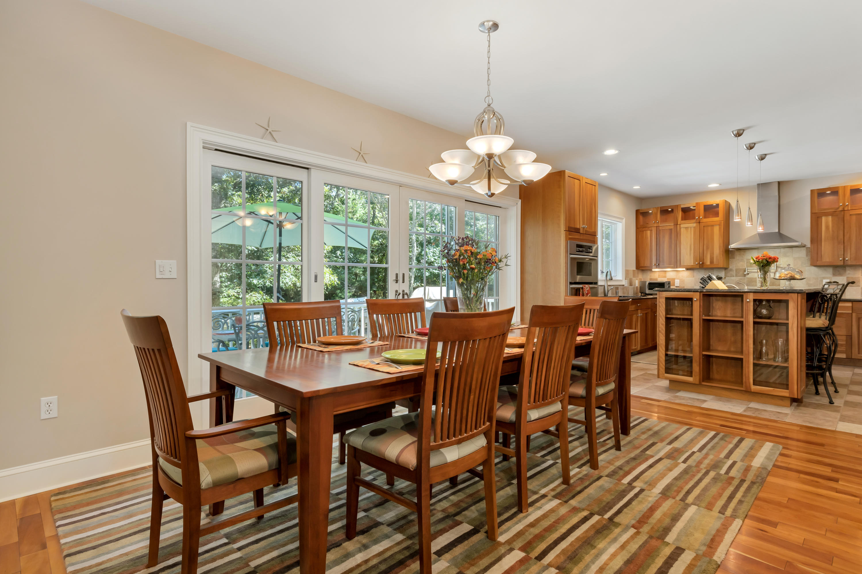 23 Harlow Road Sandwich, MA 02563 - Photo 10 of 44 a view of a dining room with furniture window and outside view