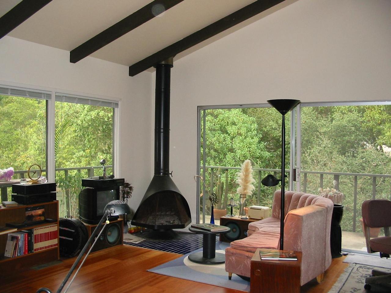 634 Cowles Road Santa Barbara, CA 93108 - Photo 3 of 4 a living room with furniture tv and large windows