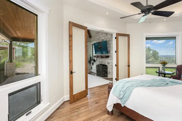 a view of a backyard with sitting area and a garden