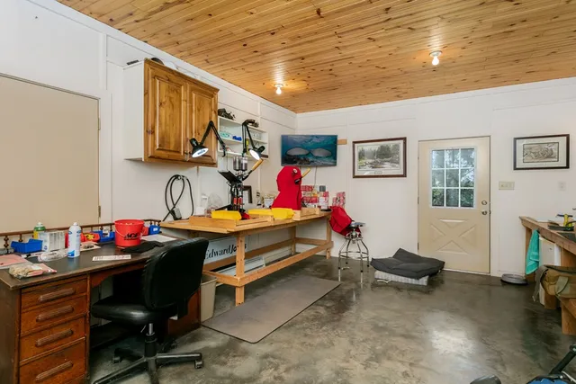 an aerial view of a house with a garden