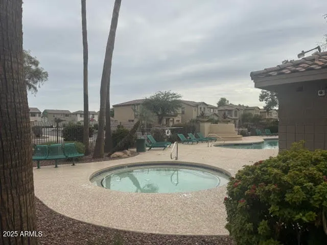 a house view with a swimming pool