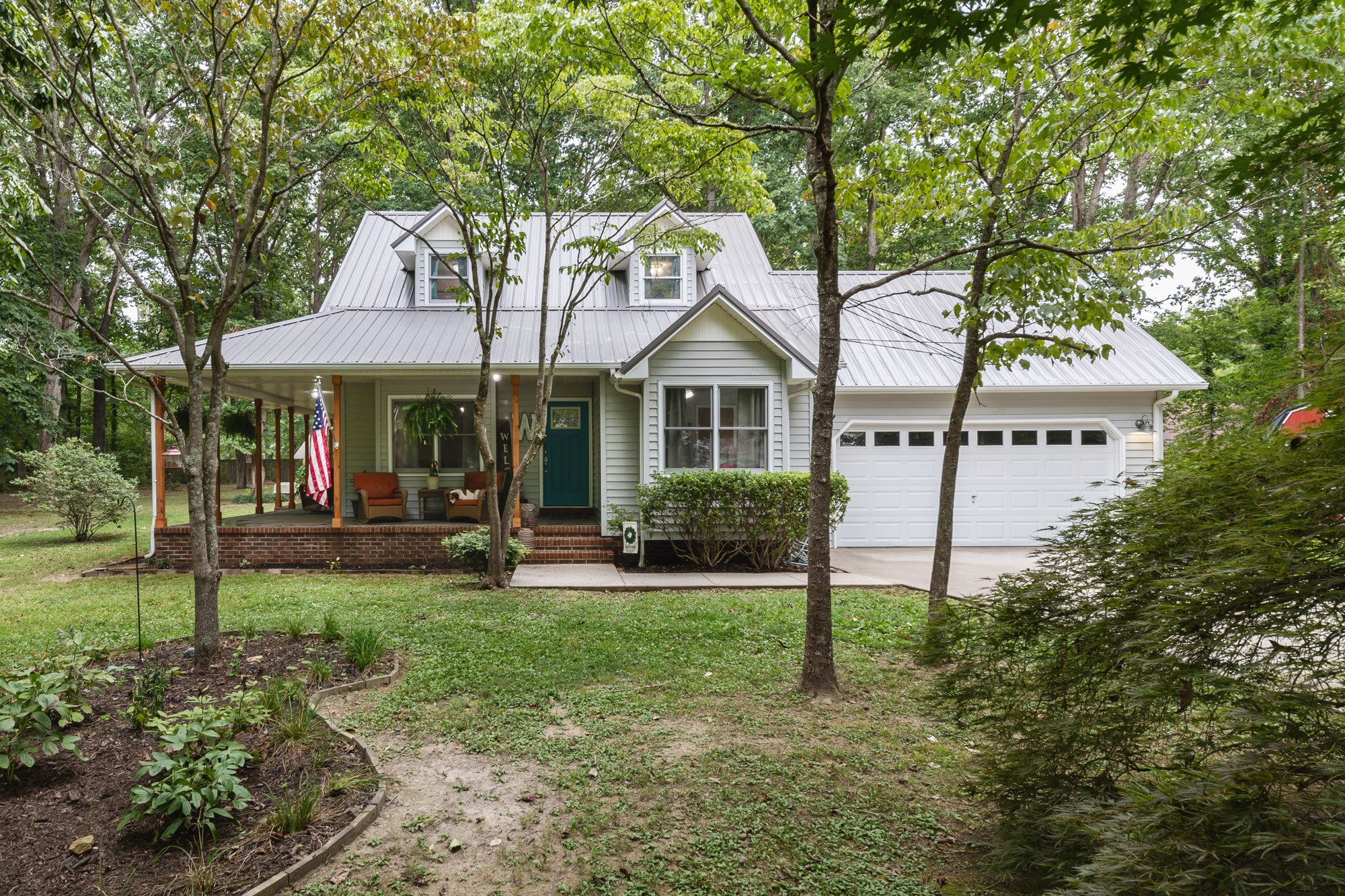 96 Smoke Rise Circle Manchester, TN 37355 - Photo 1 of 31 a view of a house with a yard porch and sitting area
