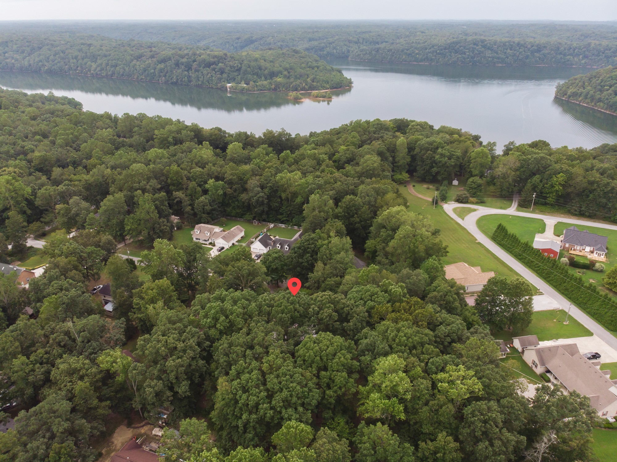 96 Smoke Rise Circle Manchester, TN 37355 - Photo 29 of 31 a view of a lake with a mountain