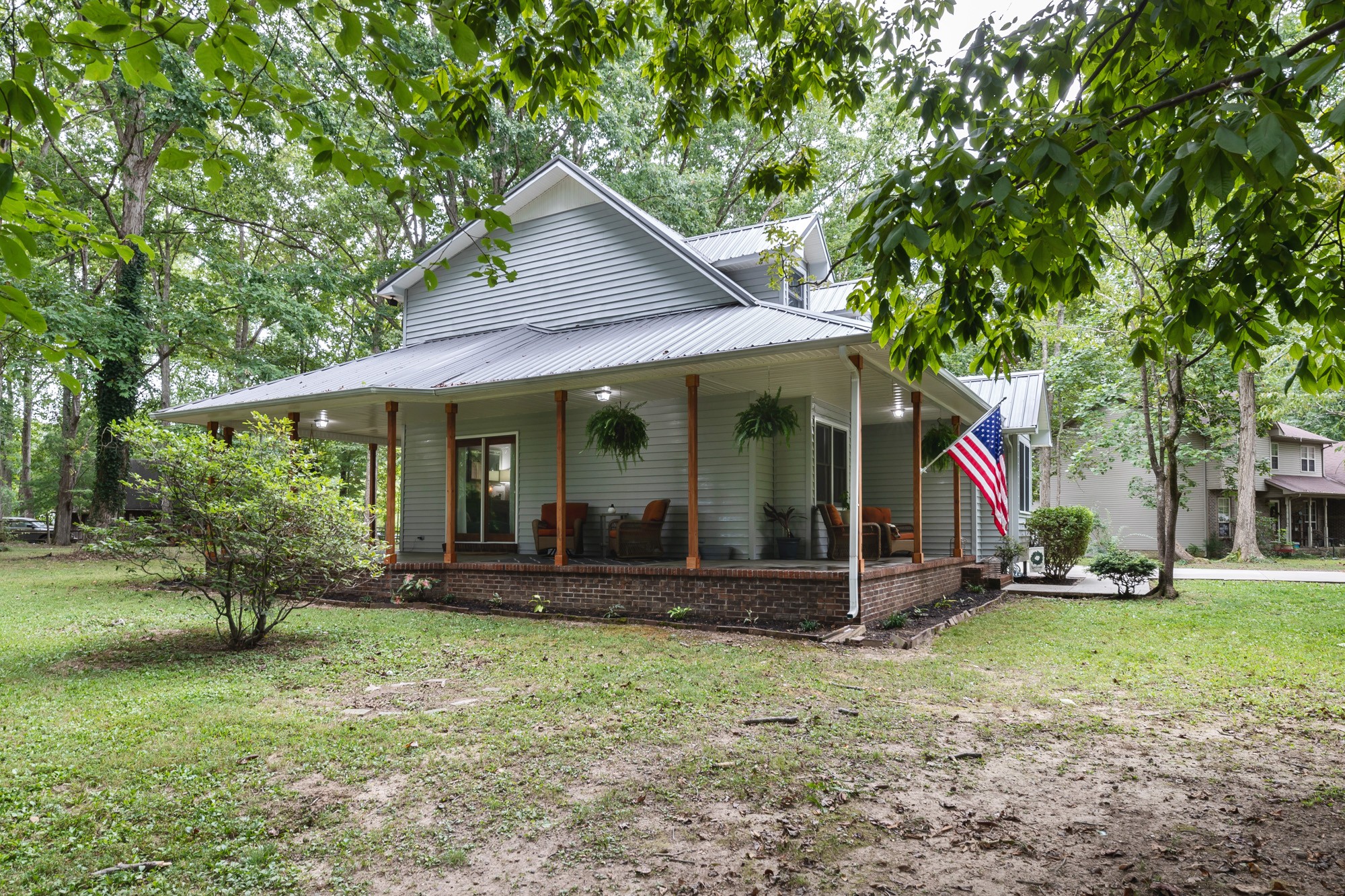 96 Smoke Rise Circle Manchester, TN 37355 - Photo 3 of 31 a view of a house with a yard porch and sitting area