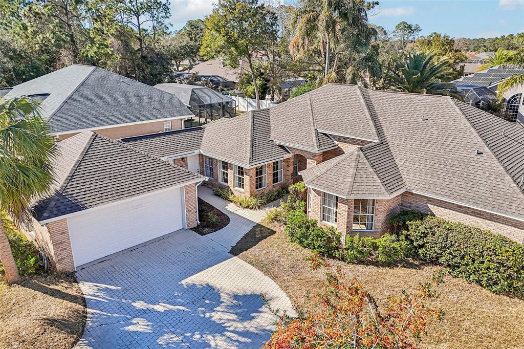 5 Watkins Place Palm Coast, FL 32164 - Photo 23 of 25 a view of a house with a yard and sitting area