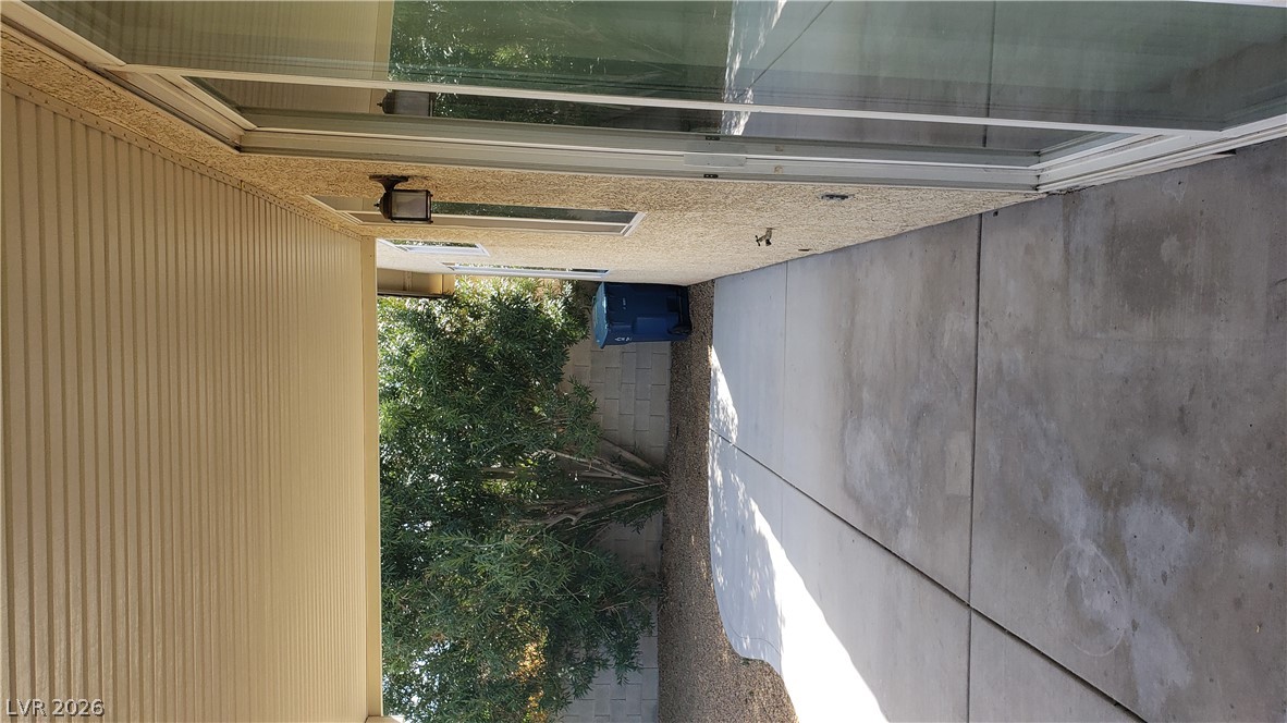 9112 Manalang Road Las Vegas, NV 89123 - Photo 10 of 50 A private covered patio provides a shaded outdoor living space.