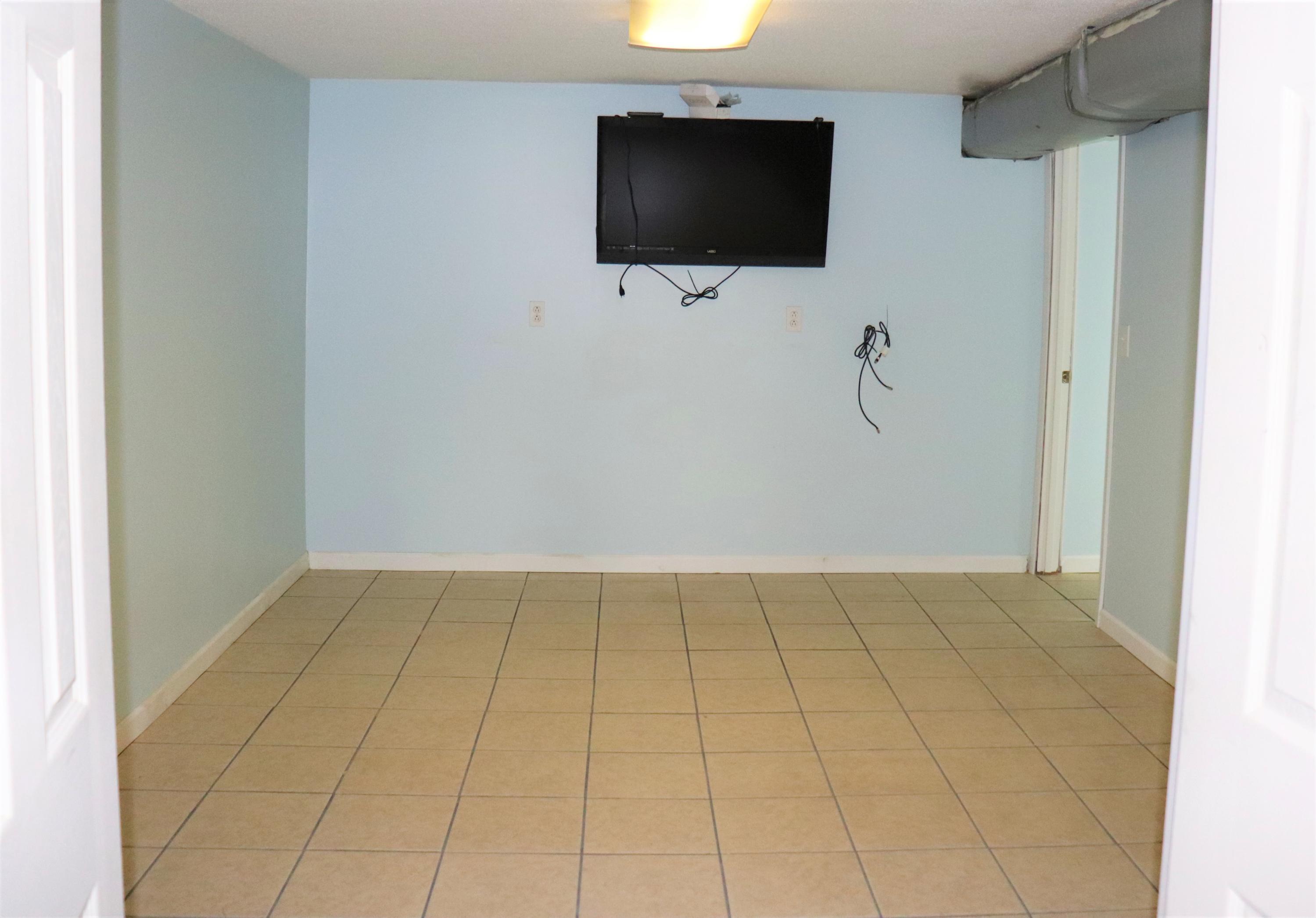 1076 Bancroft Road McDonald, TN 37353 - Photo 16 of 24 3 - bonus room tv