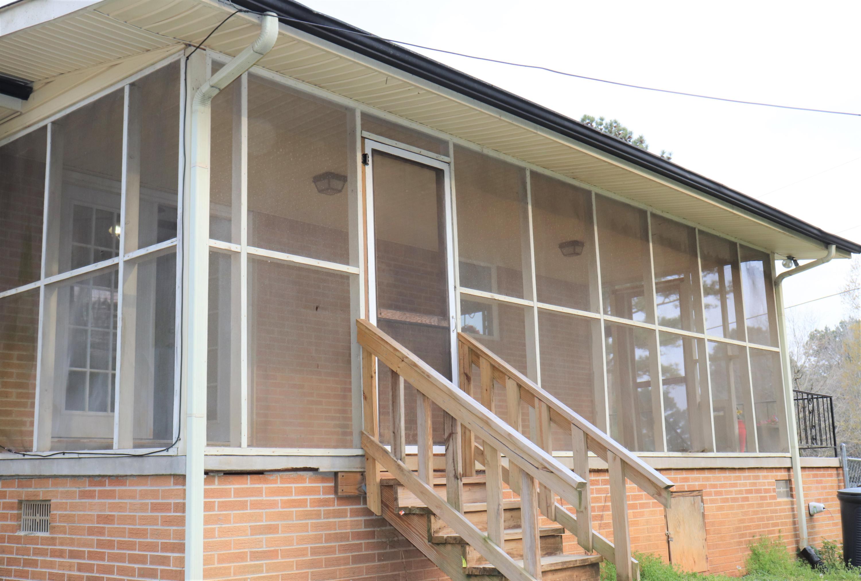 1076 Bancroft Road McDonald, TN 37353 - Photo 19 of 24 3 - screen porch from yard