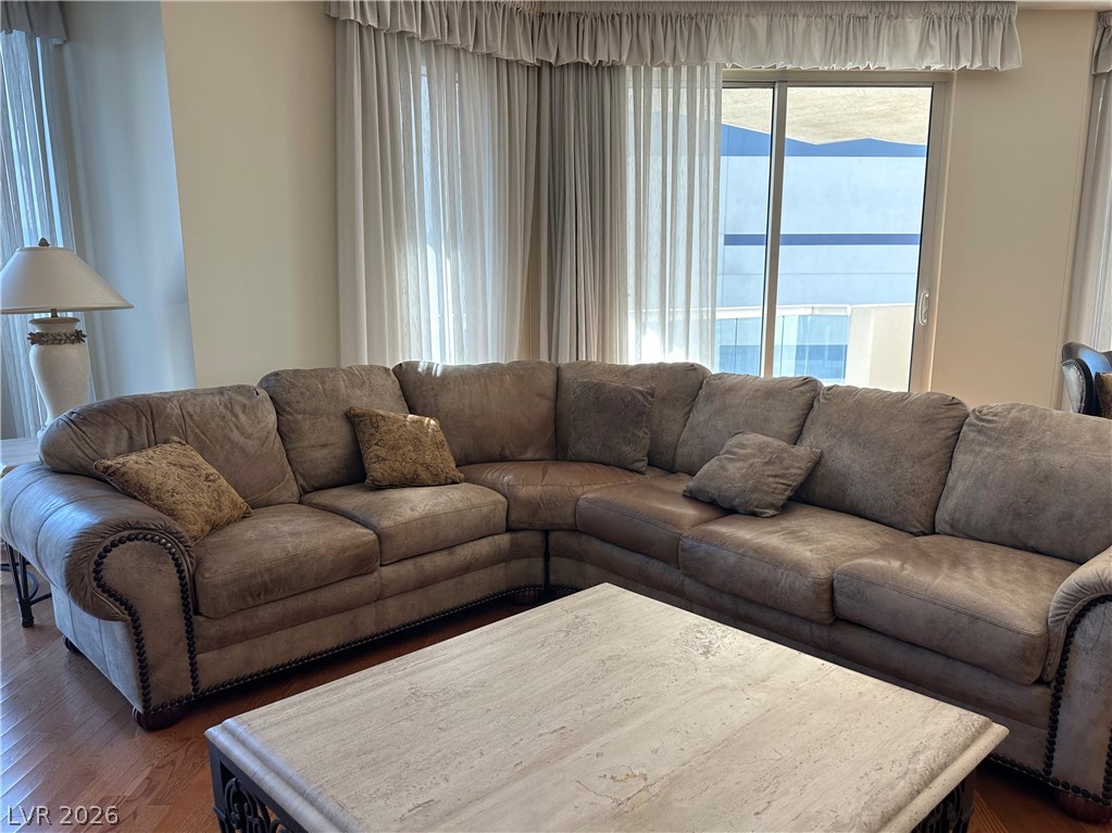 2747 Paradise Road, Unit 1706 Las Vegas, NV 89109 - Photo 2 of 35 Hardwood flooring complements a spacious living area with ample natural illumination.
