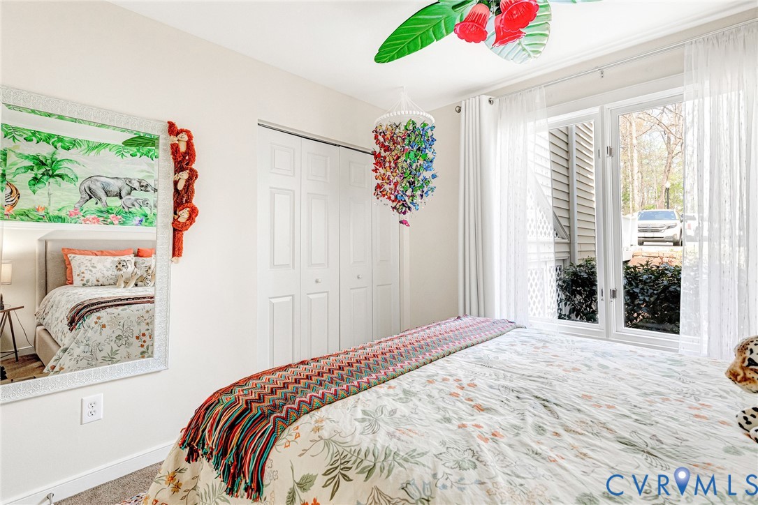 102 Water Pointe Court Midlothian, VA 23112 - Photo 28 of 35 a bedroom with a bed and a window