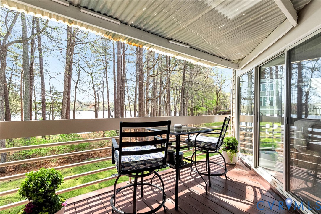102 Water Pointe Court Midlothian, VA 23112 - Photo 3 of 35 a view of a chairs and table in the balcony