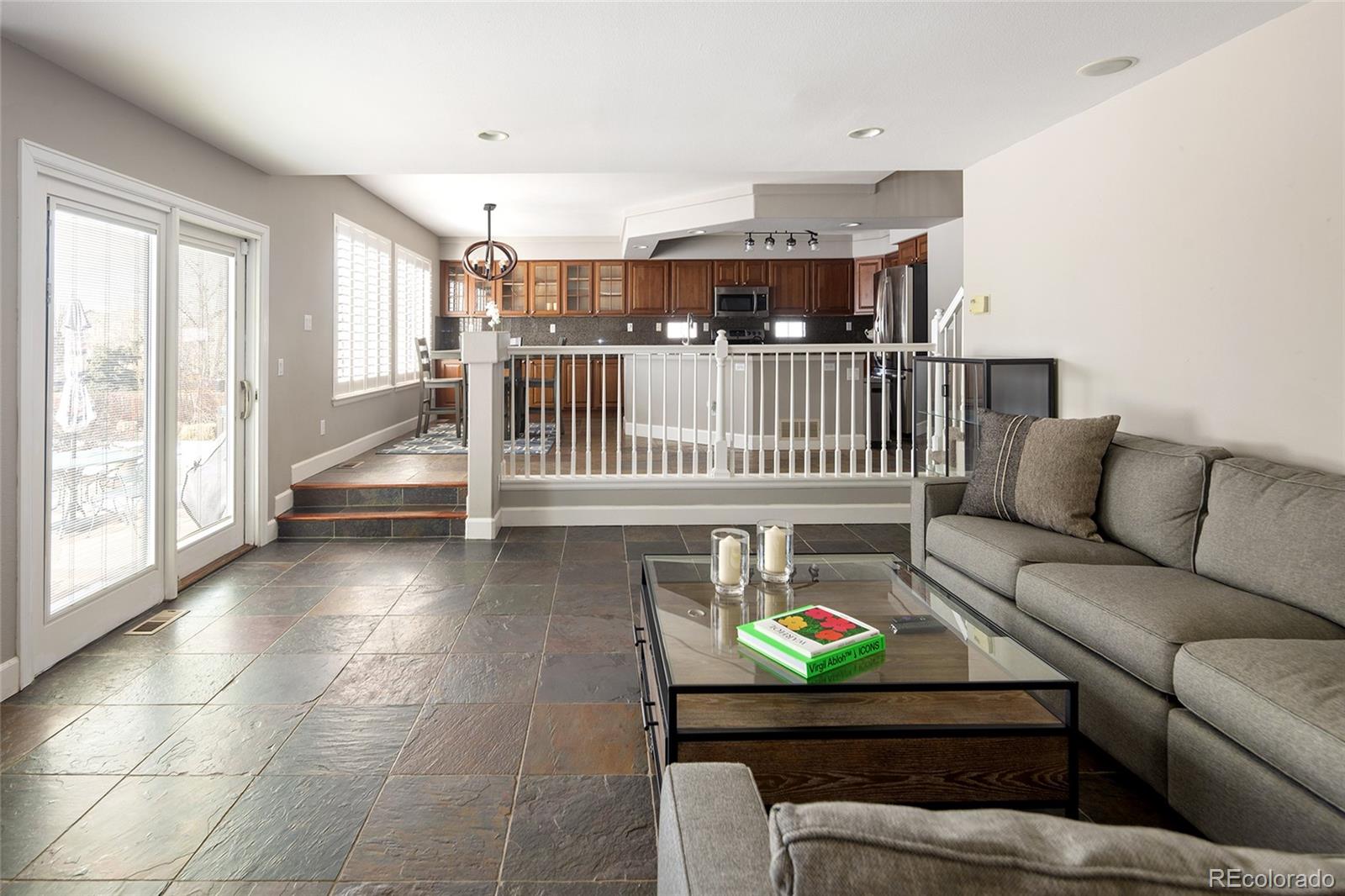 10269 Fawnbrook Court Highlands Ranch, CO 80130 - Photo 16 of 45 a living room with furniture and a window