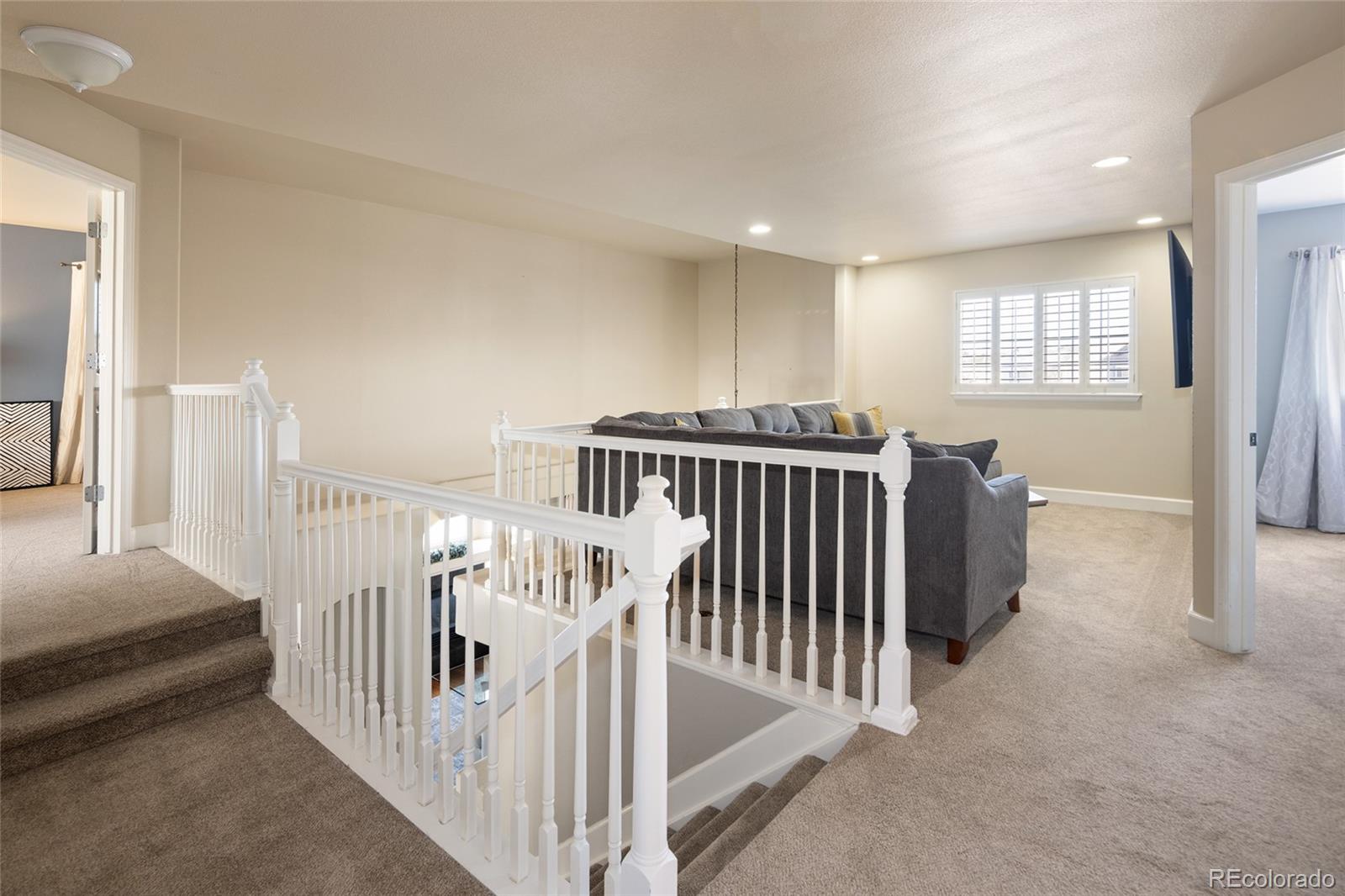 10269 Fawnbrook Court Highlands Ranch, CO 80130 - Photo 19 of 45 a view of entryway with wooden floor