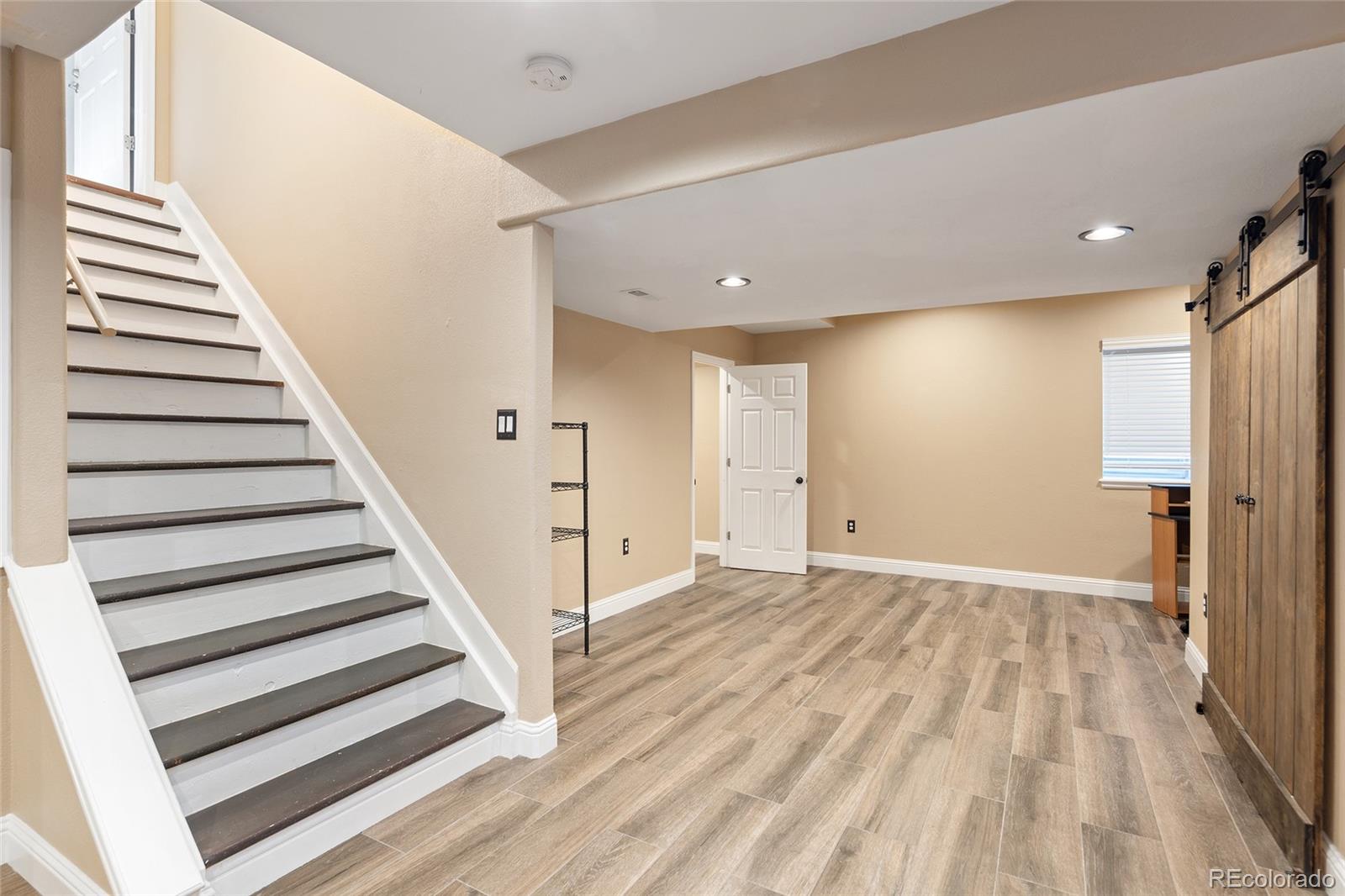 10269 Fawnbrook Court Highlands Ranch, CO 80130 - Photo 28 of 45 a view of entryway with wooden floor