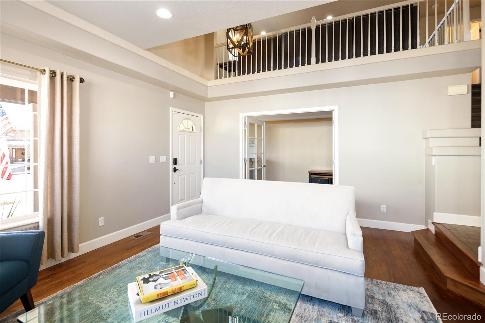 10269 Fawnbrook Court Highlands Ranch, CO 80130 - Photo 9 of 45 a living room with furniture and a window