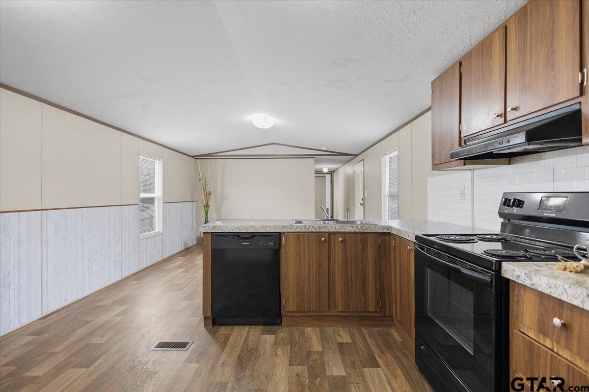 307 St Joseph Street Athens, TX 75751 - Photo 1 of 24 a kitchen with stainless steel appliances granite countertop a stove and a sink