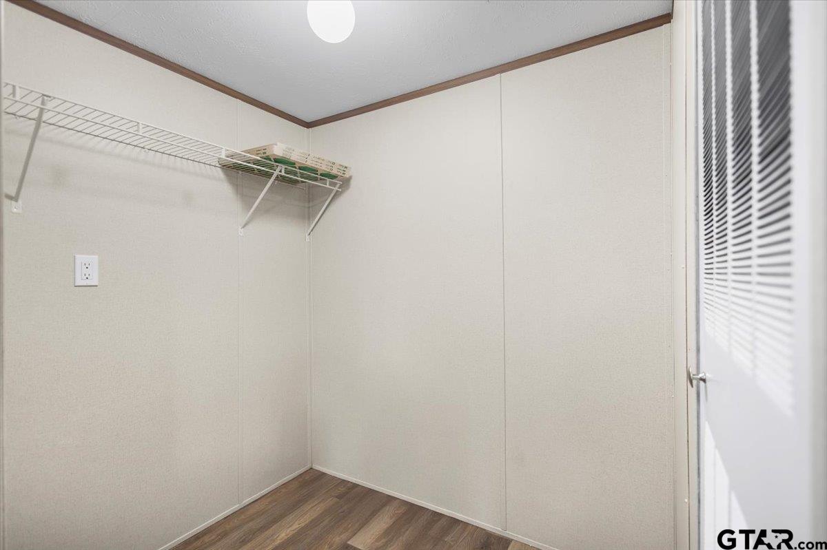 307 St Joseph Street Athens, TX 75751 - Photo 14 of 24 a view of a room with racks on the wall