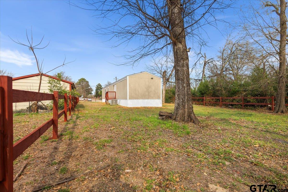307 St Joseph Street Athens, TX 75751 - Photo 22 of 24 a view of yard with tree