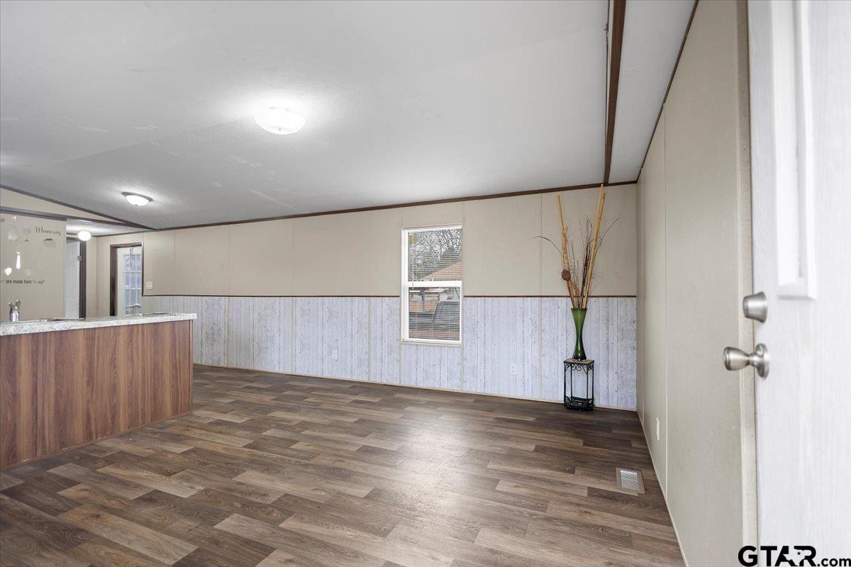 307 St Joseph Street Athens, TX 75751 - Photo 3 of 24 a view of entryway with wooden floor