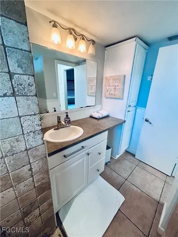 a view of a closet area with rug