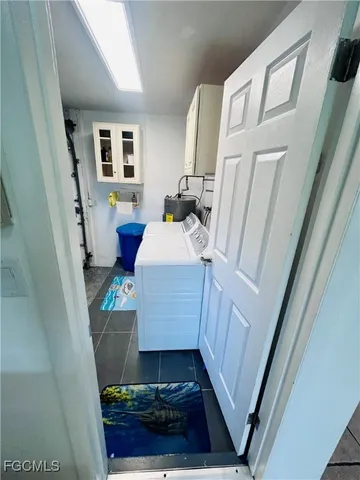 a bathroom with sink and mirror