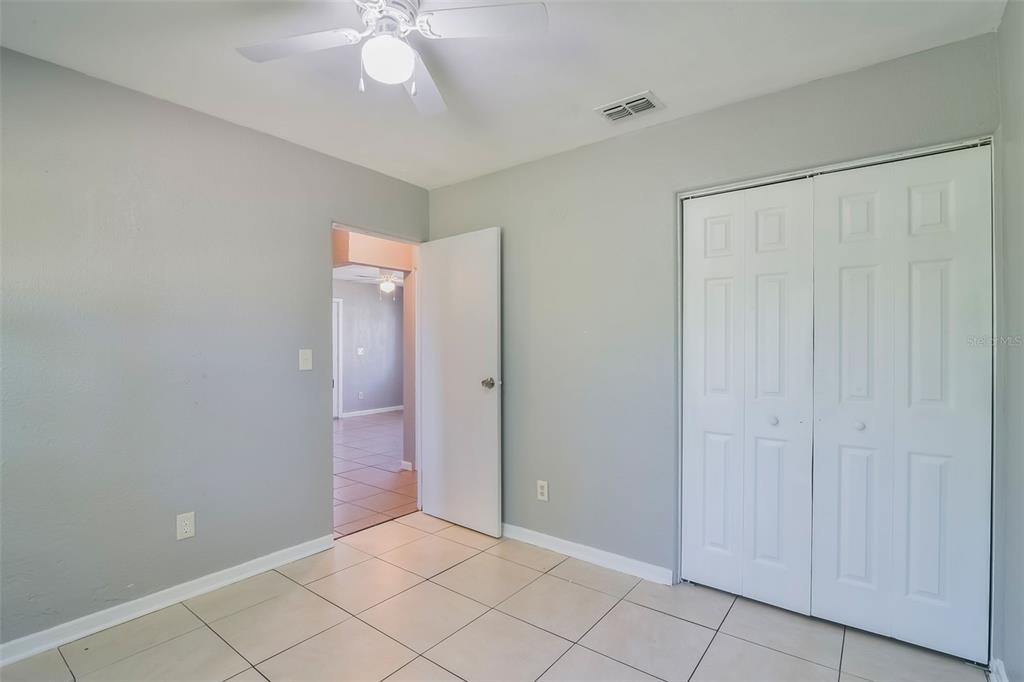 1220 Morin Street, Unit A Eustis, FL 32726 - Photo 12 of 20 an empty room with fan and entrance