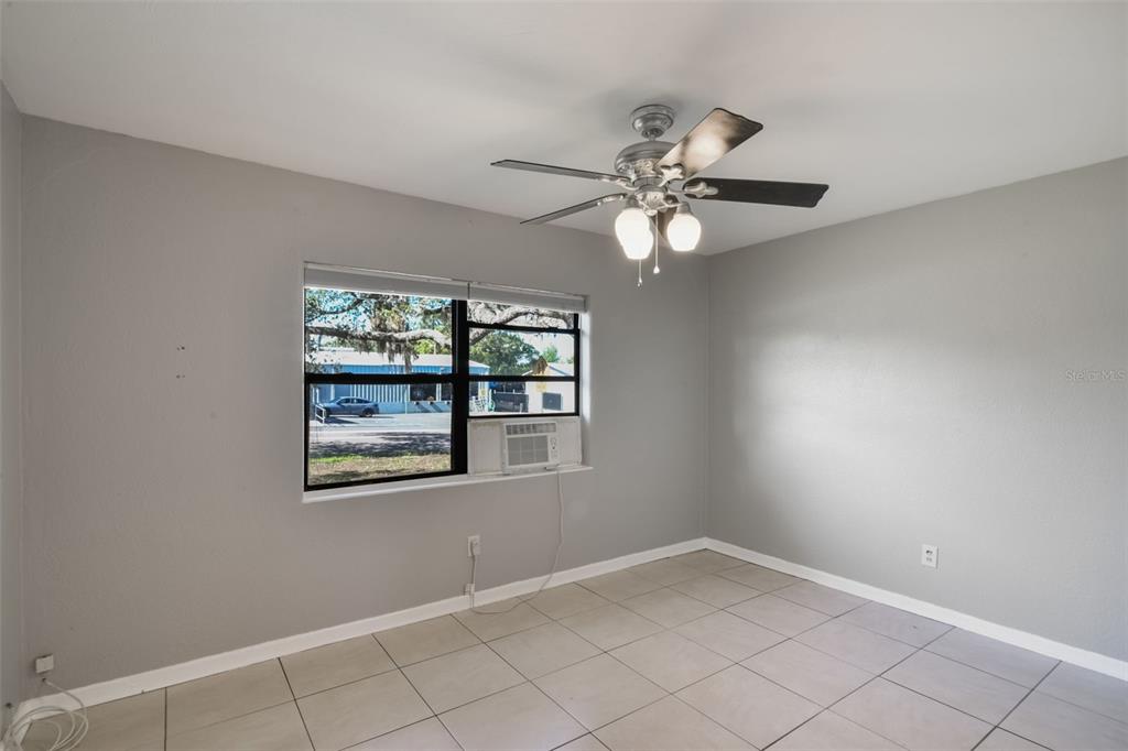 1220 Morin Street, Unit A Eustis, FL 32726 - Photo 10 of 20 an empty room with a window