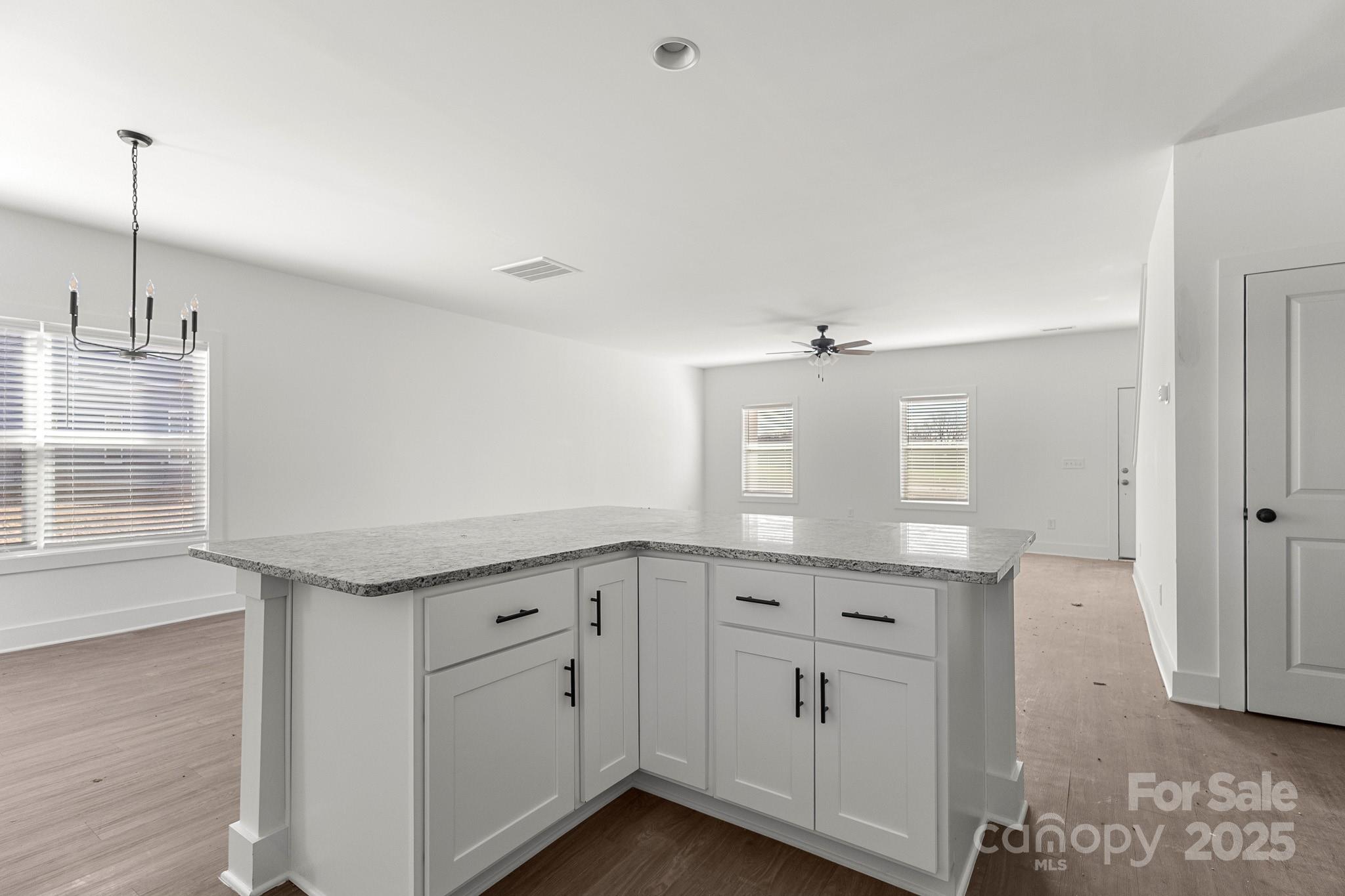 3303 Old Pageland Monroe Road Monroe, NC 28112 - Photo 11 of 37 a spacious bathroom with a granite countertop sink and a mirror
