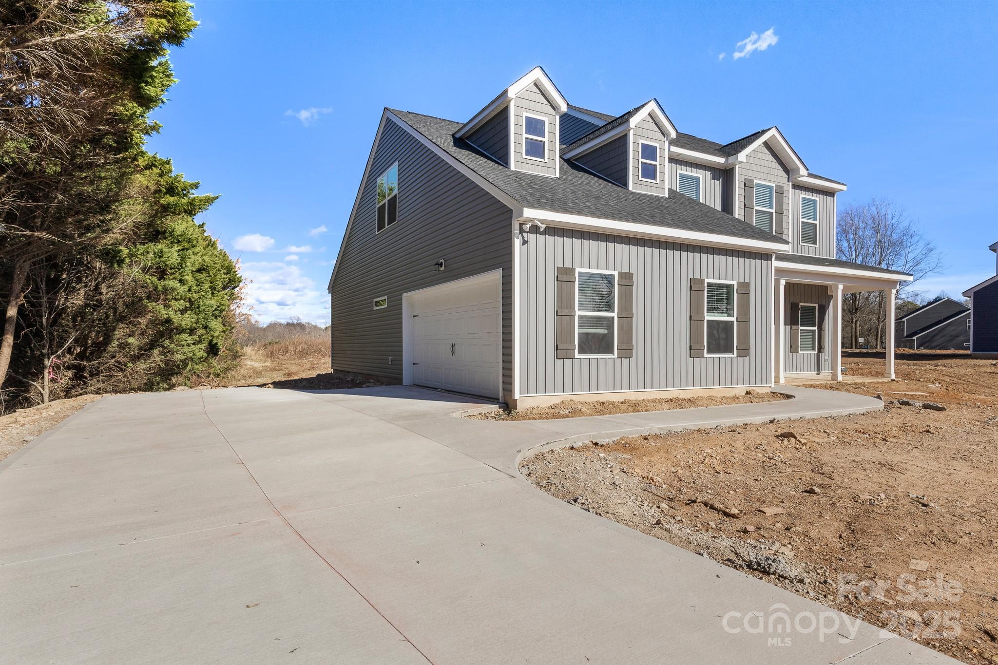 3303 Old Pageland Monroe Road Monroe, NC 28112 - Photo 33 of 37 a front view of a house with a yard
