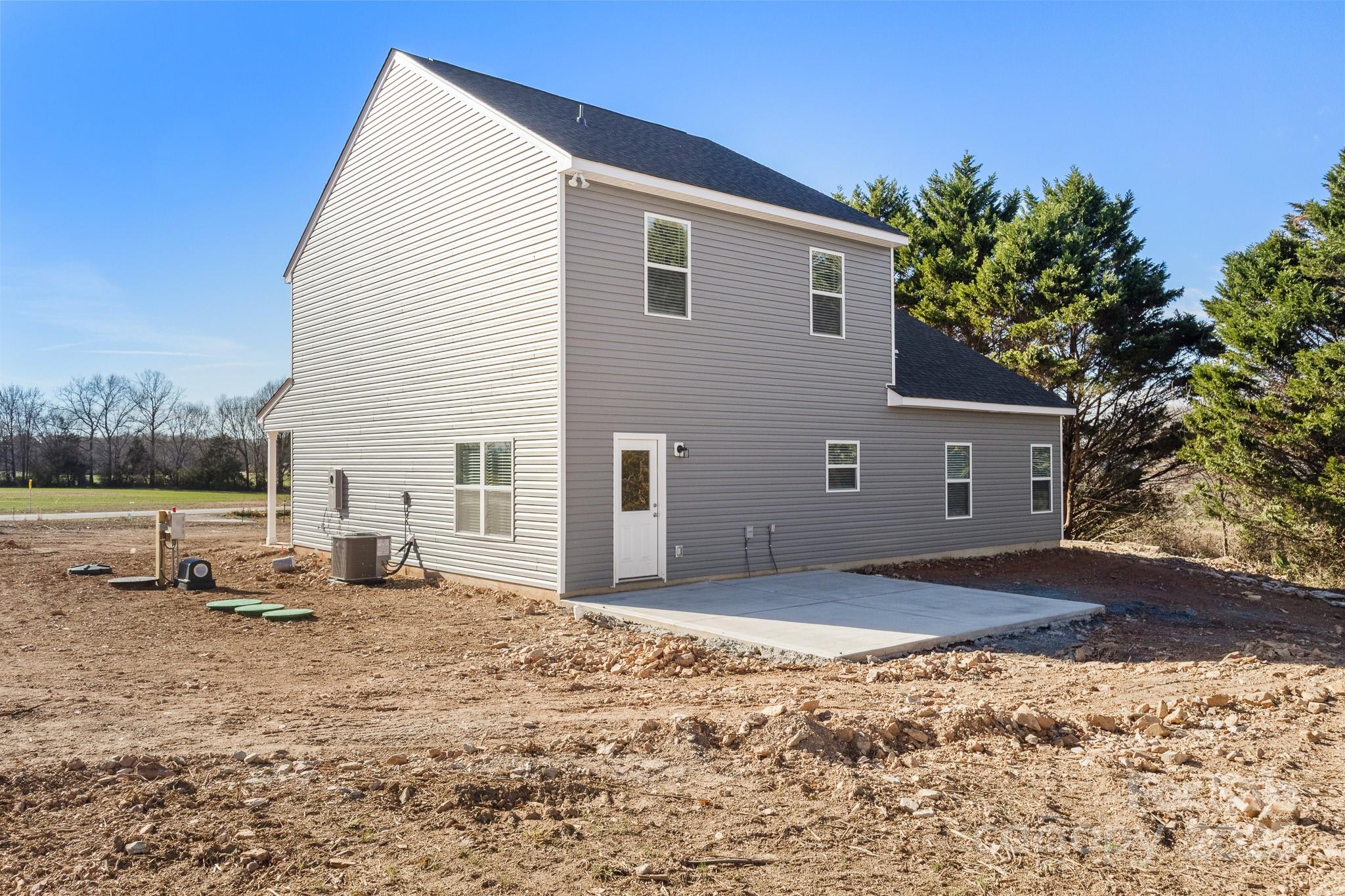 3303 Old Pageland Monroe Road Monroe, NC 28112 - Photo 36 of 37 a view of a house with backyard and sitting area