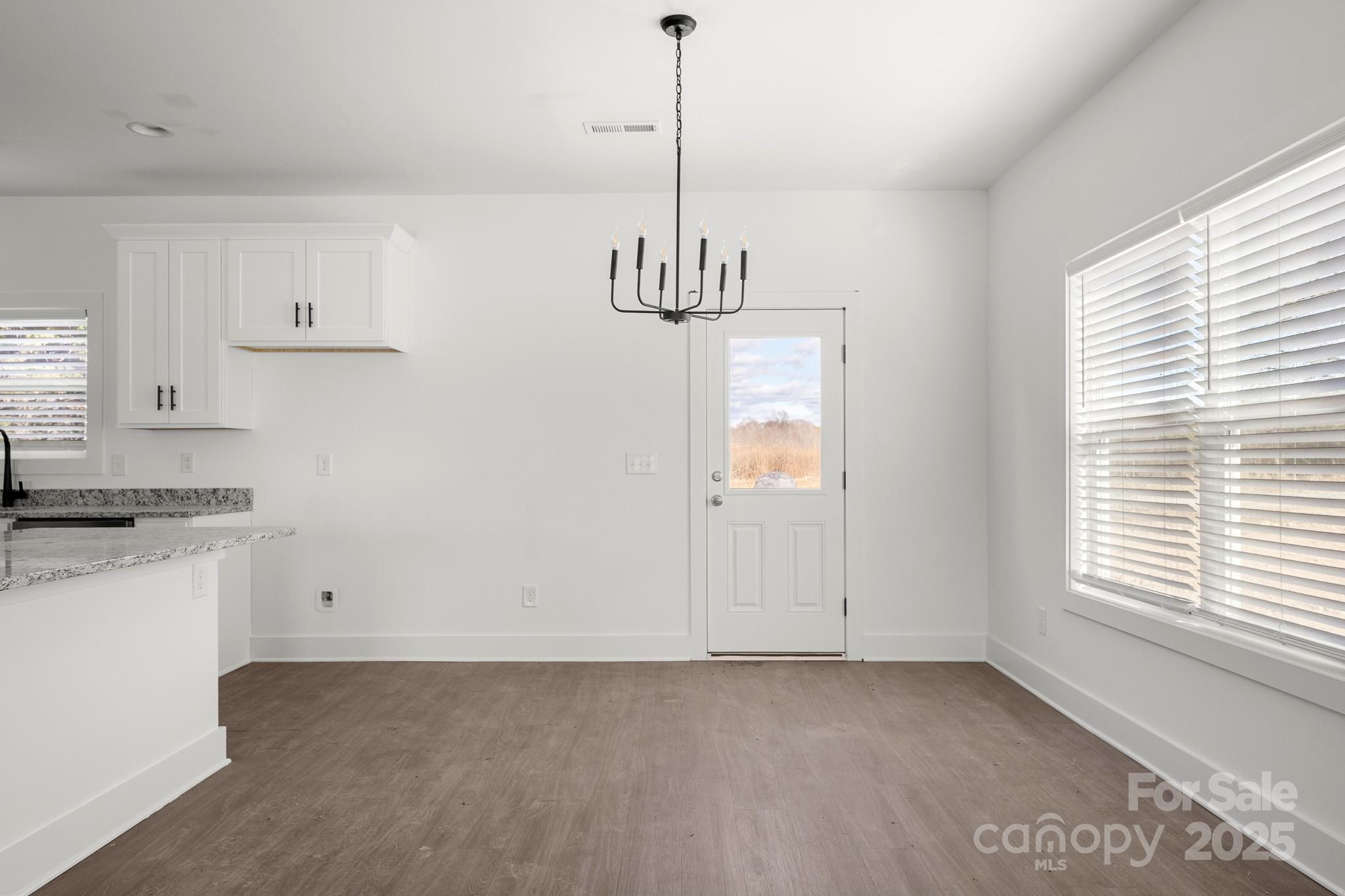 3303 Old Pageland Monroe Road Monroe, NC 28112 - Photo 8 of 37 a view of a kitchen with marble kitchen and sink
