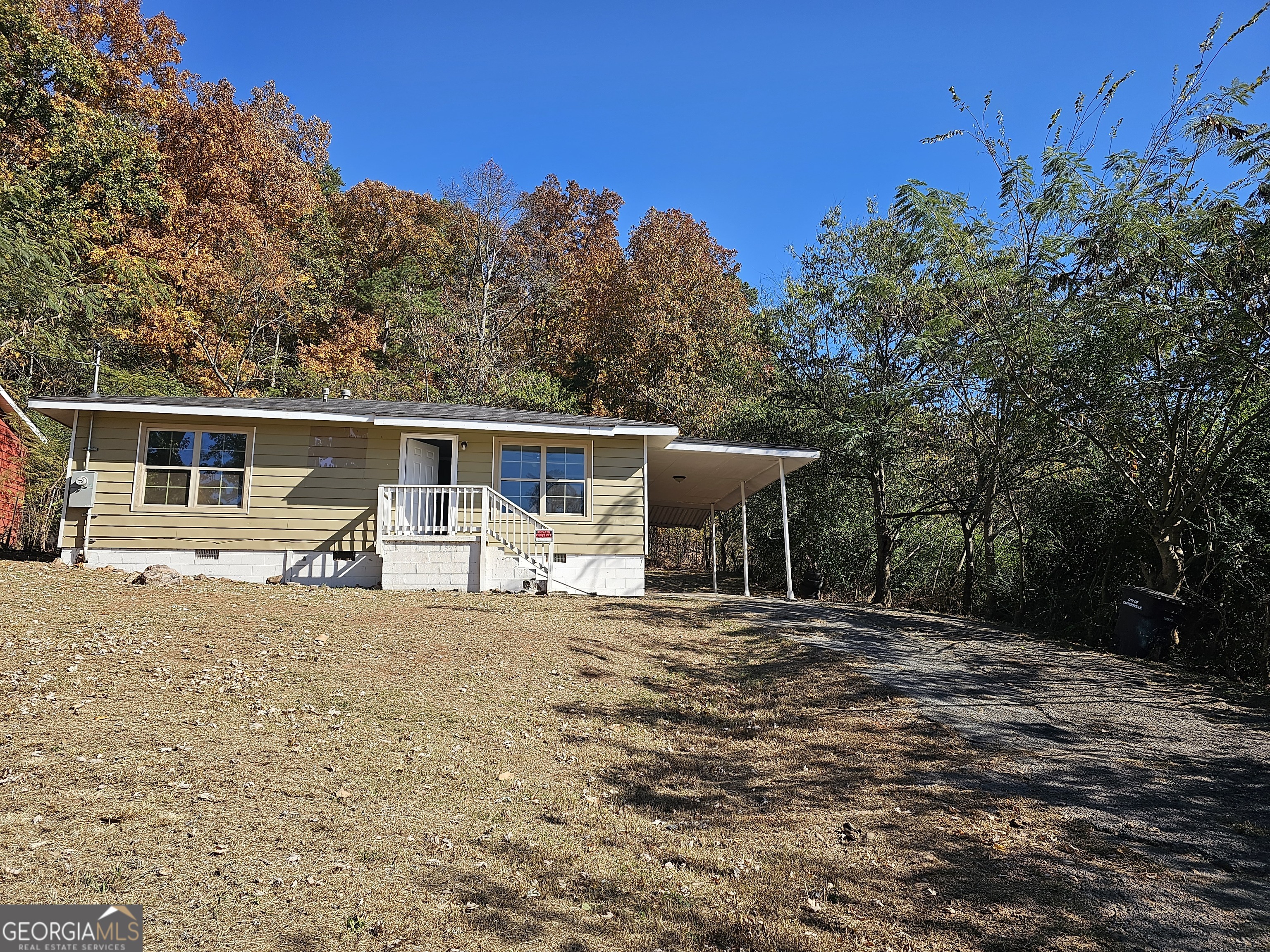 447 High Moon Drive Cartersville, GA 30121 - Photo 2 of 12 a view of a house with backyard and sitting area