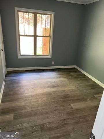 447 High Moon Drive Cartersville, GA 30121 - Photo 7 of 12 a view of a room with wooden floor and windows
