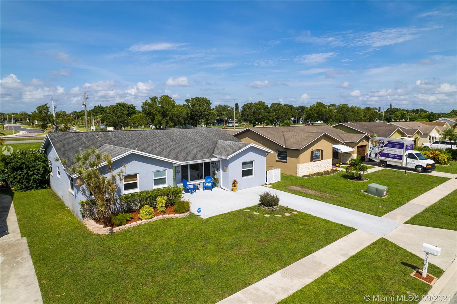 22565 Southwest 56th Avenue Boca Raton, FL 33433 - Photo 1 of 35 a aerial view of a house with a big yard