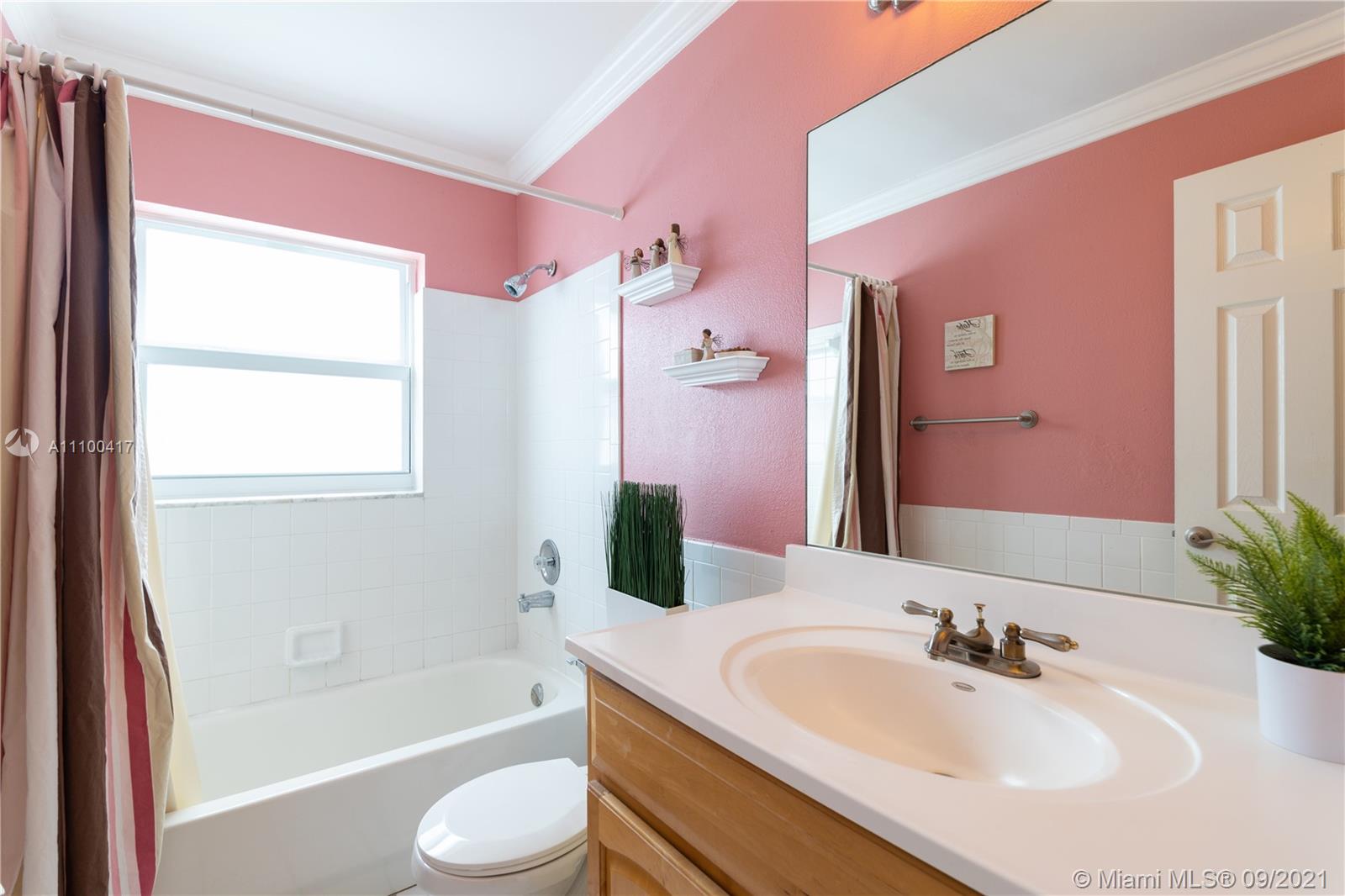 22565 Southwest 56th Avenue Boca Raton, FL 33433 - Photo 22 of 35 a bathroom with a sink toilet tub and shower