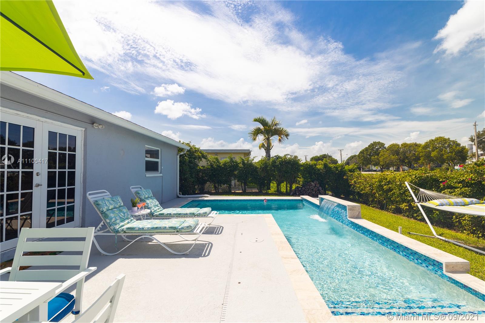 22565 Southwest 56th Avenue Boca Raton, FL 33433 - Photo 28 of 35 a house view with a garden space