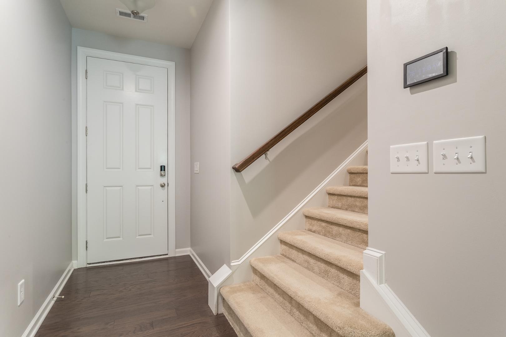 1015 Catch Fly Lane Durham, NC 27713 - Photo 5 of 26 a view of staircase with white walls and white walls