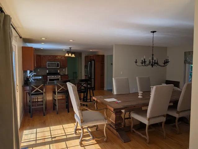 a view of a dining room with furniture