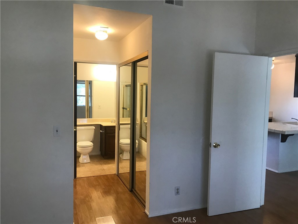 7125 Shoup Avenue, Unit 201 West Hills, CA 91307 - Photo 14 of 16 a bathroom with a sink and a mirror