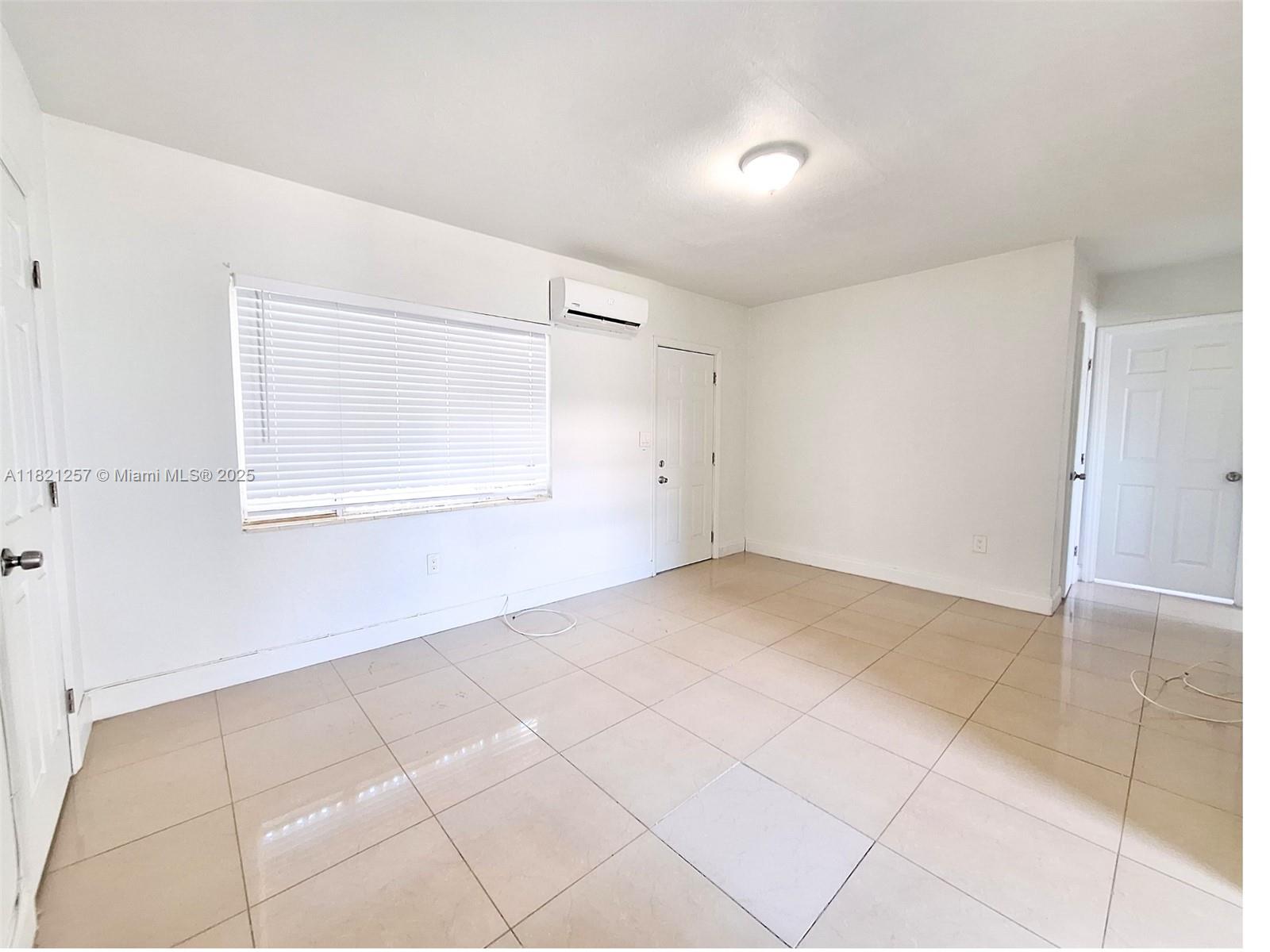 Biscayne Shores Miami, FL 33161 - Photo 13 of 21 a view of an empty room with a window